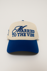 Cap with 'Married to the Vibe' text on a white background